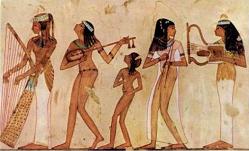 Ancient Egyptian musical instruments including a harp, a lyre and other stringed instruments